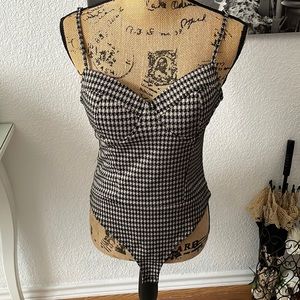 Black and tan strapped body suit